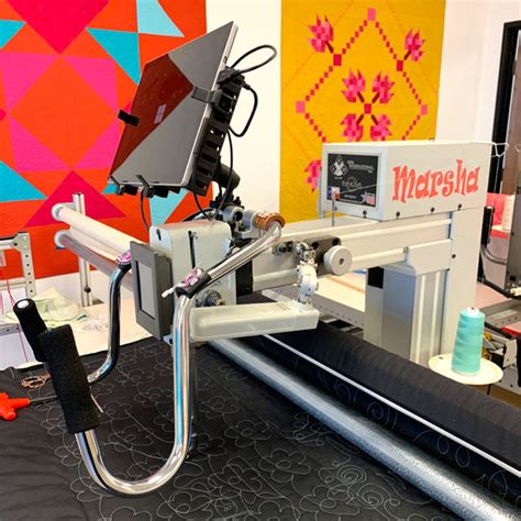 innova longarm quilting machine prices